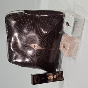 ✔️Charlotte Tilbury 4 pc Set: Makeup Bag, Spray, Magic Cream & Magic Water Cream